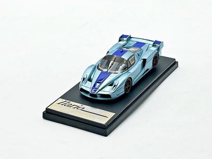 ILARIO - IL43023B - FERRARI FXX 2005 METAL BLUE WITH BLUE STRIPE