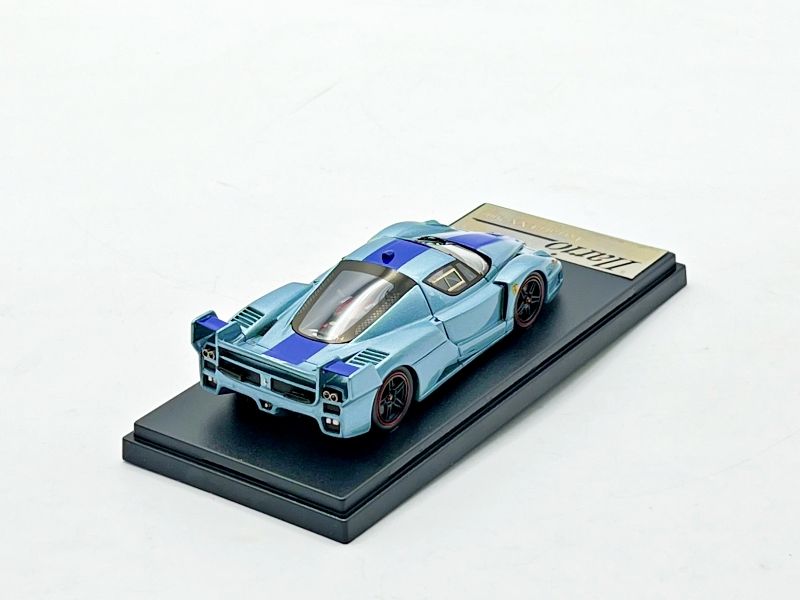 ILARIO - IL43023B - FERRARI FXX 2005 METAL BLUE WITH BLUE STRIPE